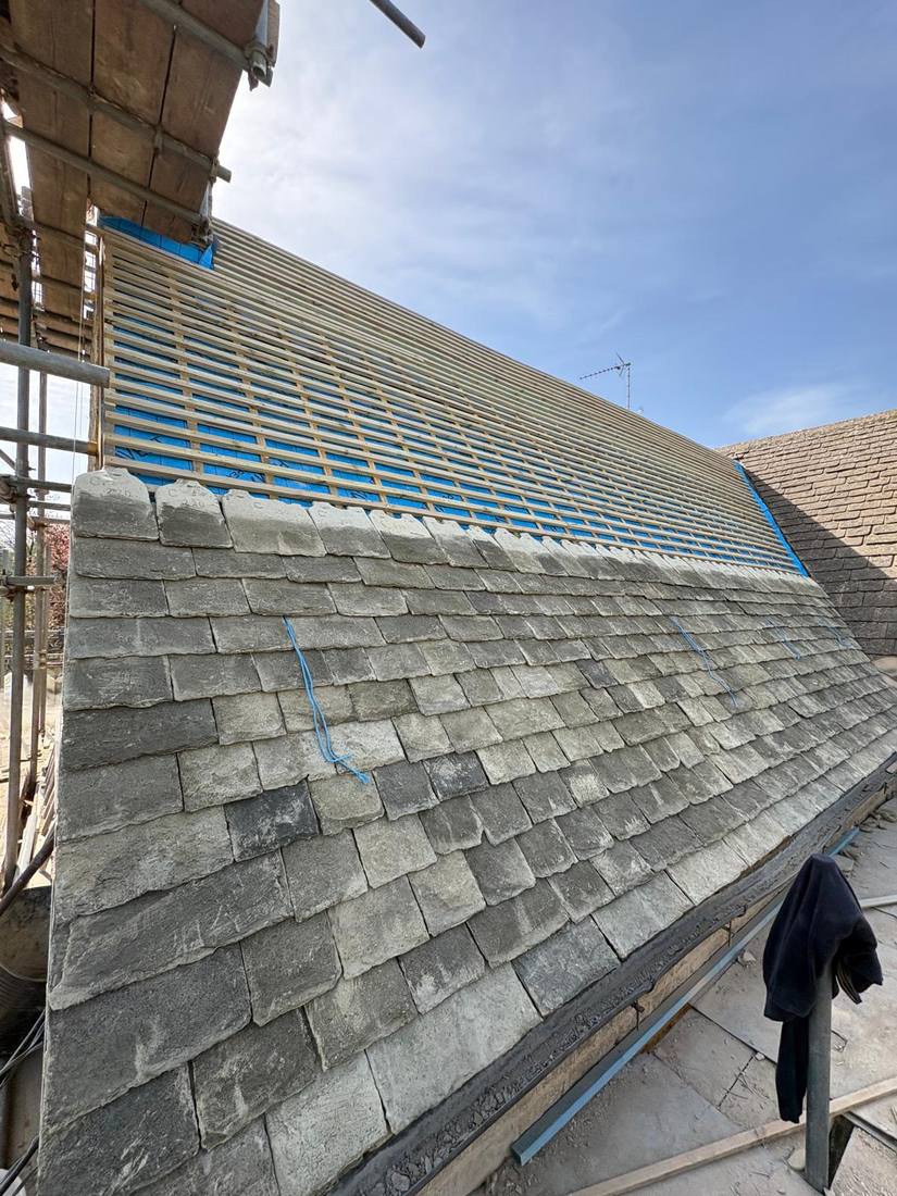Imitation Cotswold stone roof battens ready for tiling