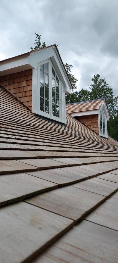 Cedar shingle roof with dormer windows