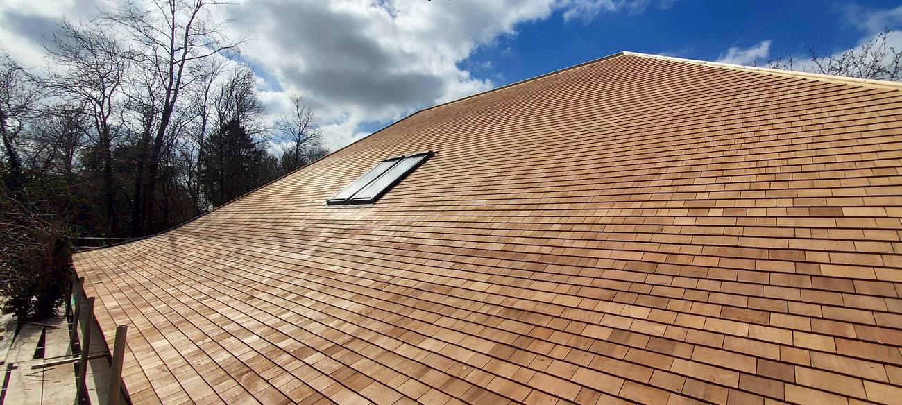 Cedar shingle roof with skylight